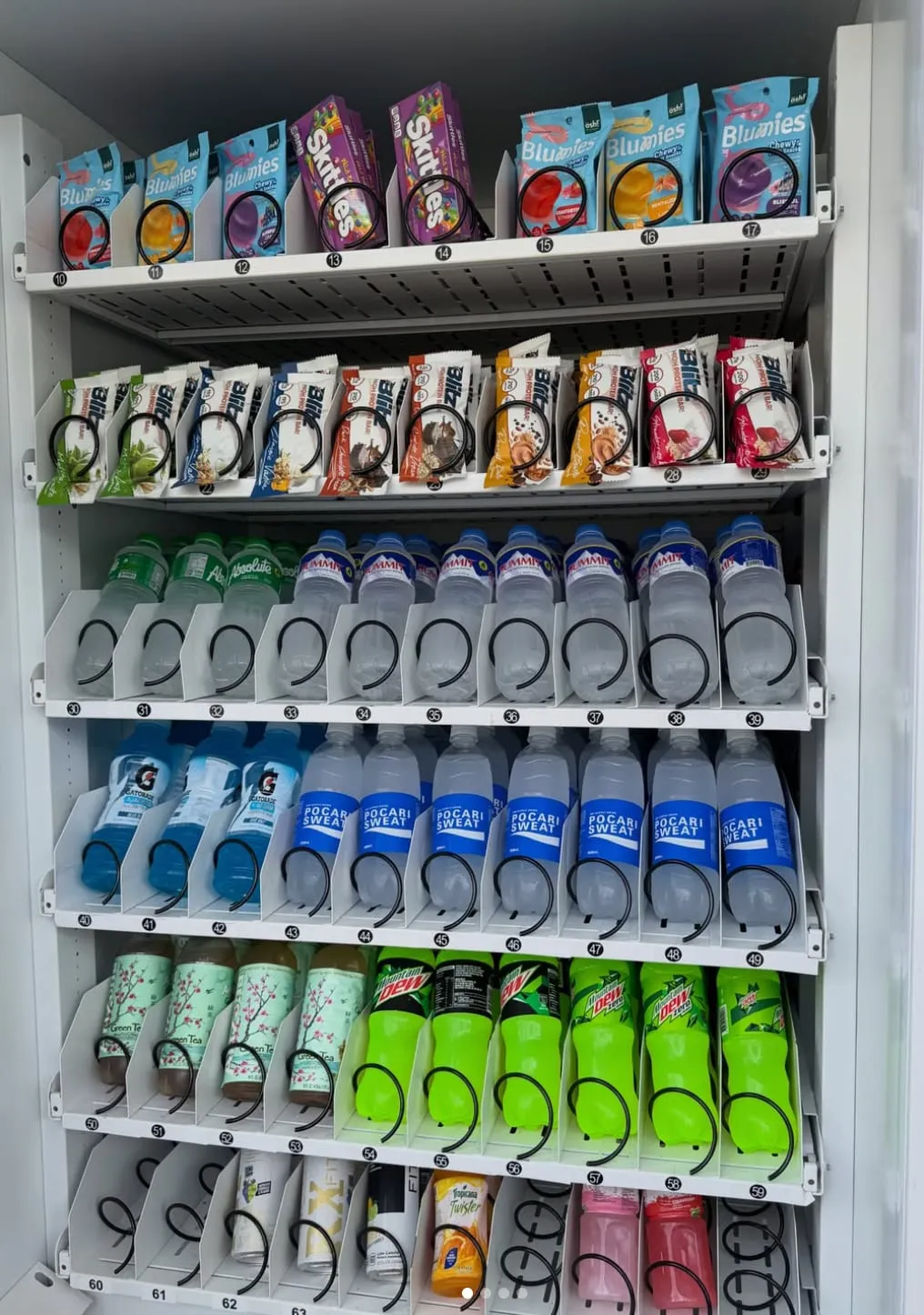 A VenGo vending machine stocked with snacks, drinks, and collectibles